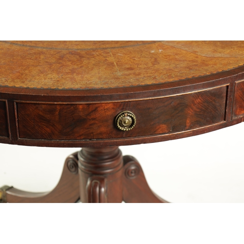 1418 - A REGENCY FLAME MAHOGANY DRUM TABLE with a leather top above a shallow freeze with fitted drawers, r... 