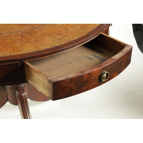 1418 - A REGENCY FLAME MAHOGANY DRUM TABLE with a leather top above a shallow freeze with fitted drawers, r... 