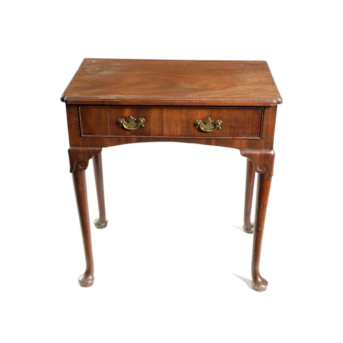 1419 - A GEORGE II FIGURED MAHOGANY SIDE TABLE the short grain frieze drawer fitted shaped brass handles an... 