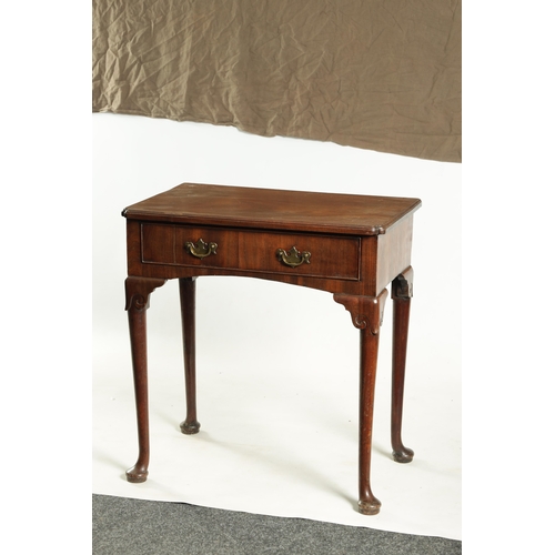 1419 - A GEORGE II FIGURED MAHOGANY SIDE TABLE the short grain frieze drawer fitted shaped brass handles an... 