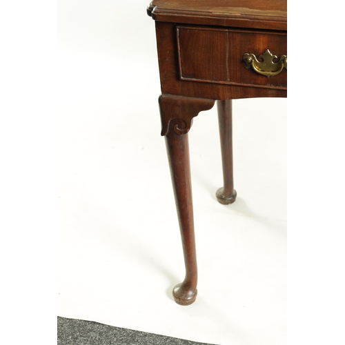 1419 - A GEORGE II FIGURED MAHOGANY SIDE TABLE the short grain frieze drawer fitted shaped brass handles an... 