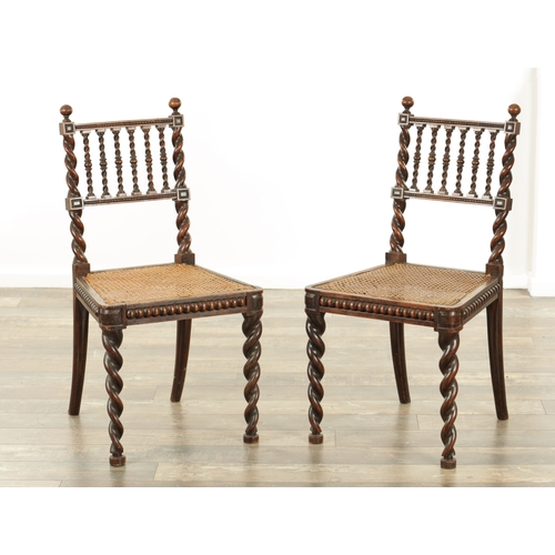 1421 - A PAIR OF LATE 19TH CENTURY OAK HALL CHAIRS with barely twist frames and Bergere seats (44cm wide 85... 