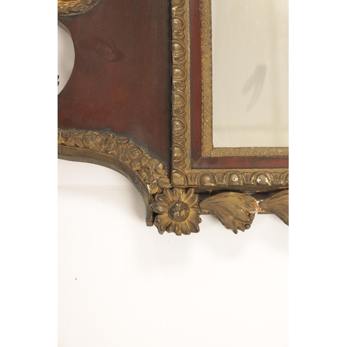 1428 - A GEORGE II MAHOGANY AND GILT GESSO HANGING MIRROR with a shaped swan-neck top and urn finial above ... 