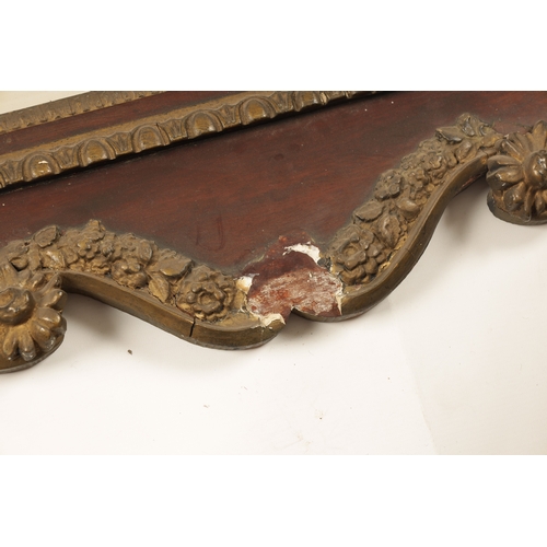 1428 - A GEORGE II MAHOGANY AND GILT GESSO HANGING MIRROR with a shaped swan-neck top and urn finial above ... 