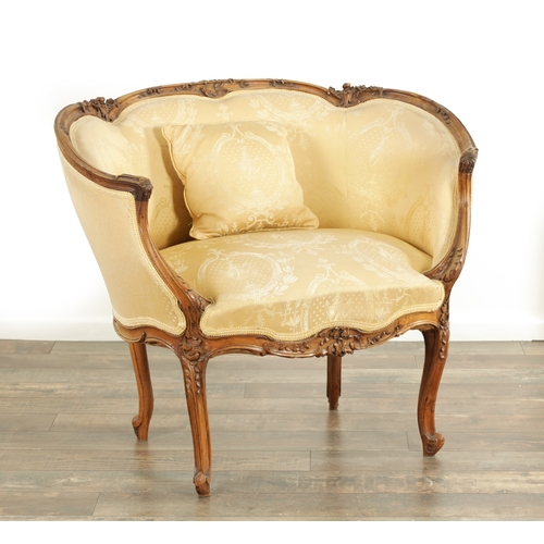 1528 - A LATE 19TH CENTURY FRENCH CARVED WALNUT UPHOLSTERED LOVE SEAT with leaf-carved rococo style frame. ... 