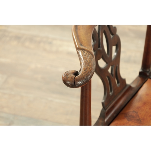 1529 - A GEORGE II MAHOGANY CHIPPENDALE STYLE CORNER CHAIR with leaf-carved top rail and eagle head arms ra... 