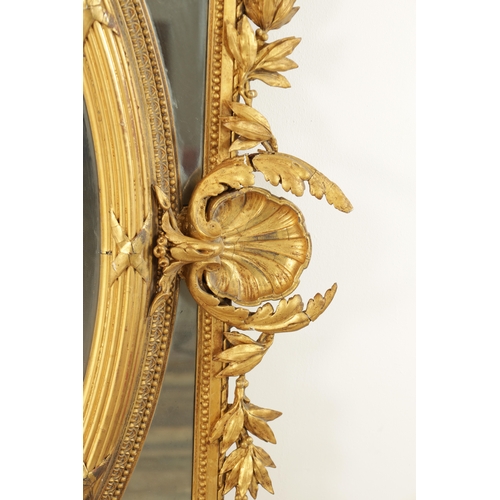 1415 - AN IMPRESSIVE 19TH CENTURY CARVED GILT WOOD OVER MANTEL MIRROR OF LARGE SIZE having an oval bevelled... 