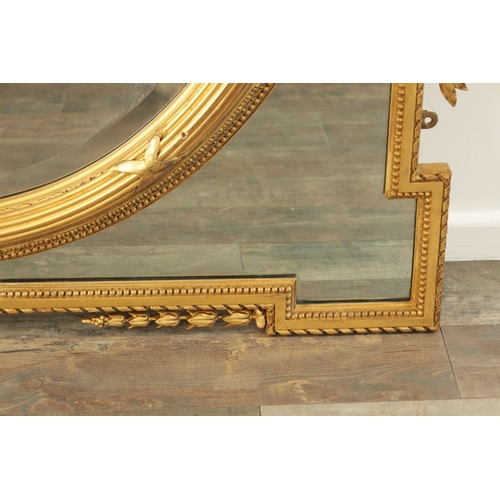 1415 - AN IMPRESSIVE 19TH CENTURY CARVED GILT WOOD OVER MANTEL MIRROR OF LARGE SIZE having an oval bevelled... 