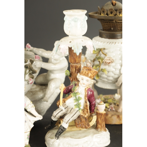 101 - A COLLECTION OF PORCELAIN comprising a pair of Sitzendorf candlesticks modelled as summer and winter... 