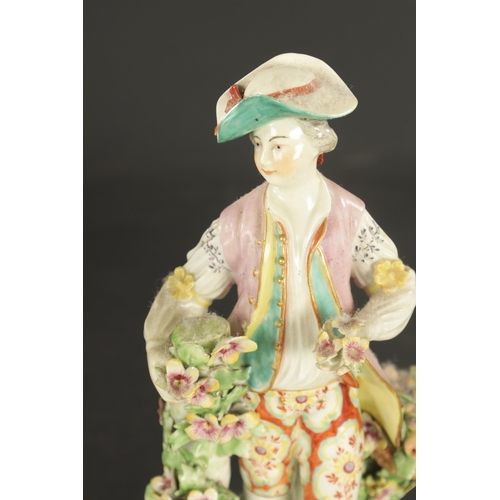 111 - TWO DERBY PORCELAIN FIGURES CIRCA 1765 one of a man with a basket gathering fruit and a girl gatheri... 