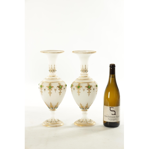 12 - A PAIR OF 19TH CENTURY FRENCH JEWELLED OPAQUE GLASS PEDESTAL VASES the shouldered bodies and flared ... 