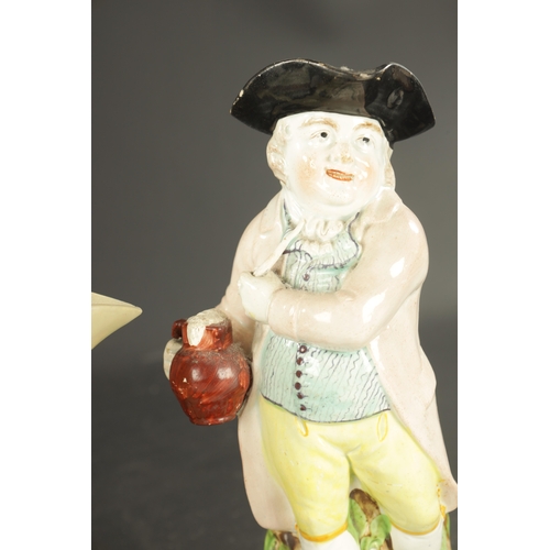 126 - TWO STAFFORDSHIRE TOBY JUBS CIRCA 1830 comprising of a nightwatchmen toby jug, probably Enoch Wood a... 