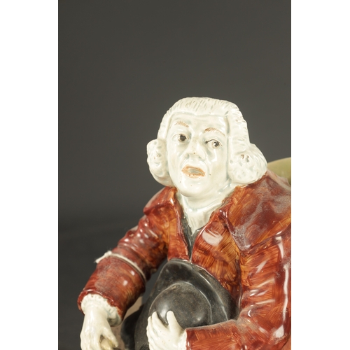 126 - TWO STAFFORDSHIRE TOBY JUBS CIRCA 1830 comprising of a nightwatchmen toby jug, probably Enoch Wood a... 