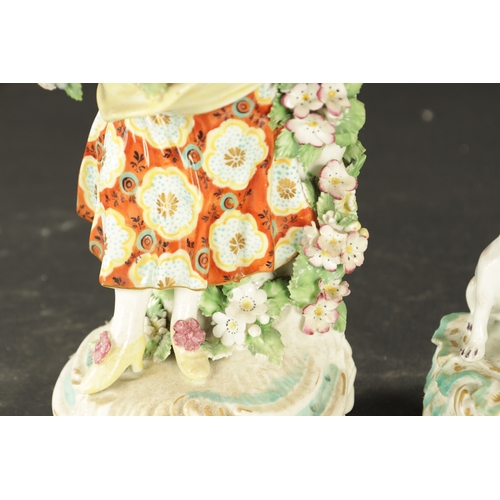 131 - A PAIR OF MID 18TH CENTURY DERBY PORCELAIN FIGURES of a man and woman (26cm high and smaller)