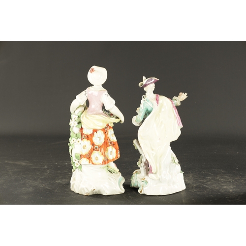 131 - A PAIR OF MID 18TH CENTURY DERBY PORCELAIN FIGURES of a man and woman (26cm high and smaller)