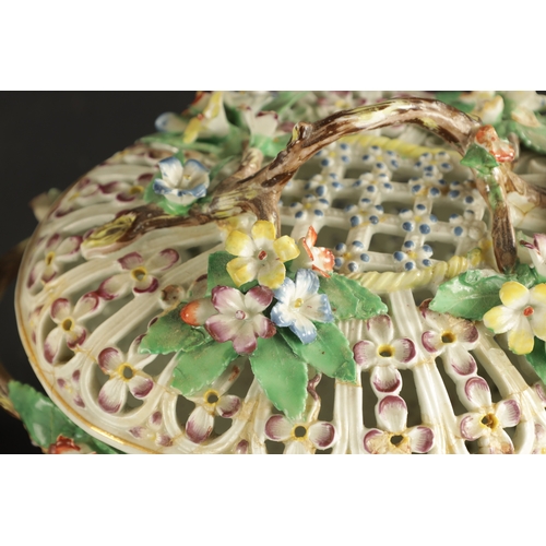 139 - A WORCESTER PORCELAIN CHESTNUT BASKET AND COVER WITH ENAMELLED FLOWER DECORATION CIRCA 1770 (20cm wi... 