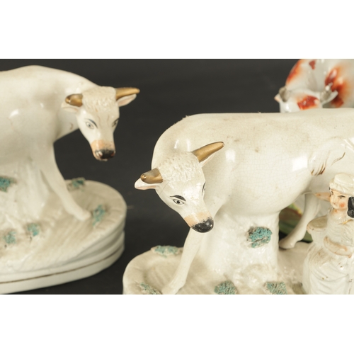 142 - VARIOUS LATE 19TH CENTURY STAFFORDSHIRE COW GROUPS (27cm high and smaller)