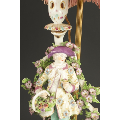 148 - A FRENCH PORCELAIN LAMP FIGURE of a boy with a basket of fruit in the derby style (36cm High)