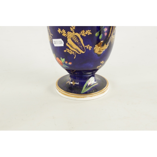 149 - A SPODE PORCELAIN VASE PAINTED WITH FLOWERS ON A COBALT GROUND (21cm high)