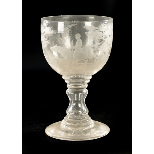 15 - A LATE GEORGIAN GLASS GOBLET with engraved Horse jumping and landscape scene to the bowl (22.5cm hig... 