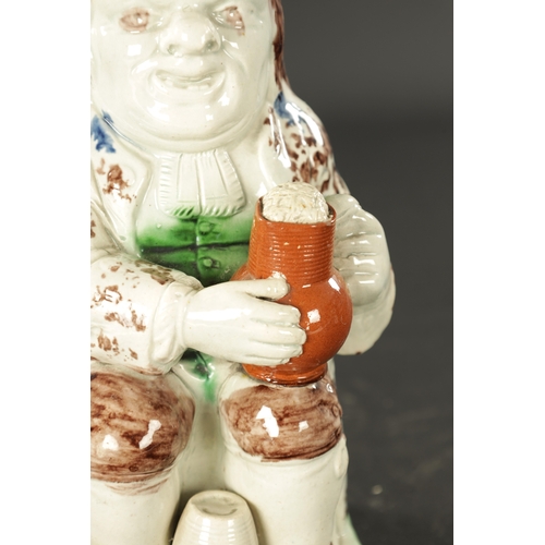 155 - A LATE 18TH CENTURY RALPH WOOD STYLE TOBY JUG with petal base decoration (25cm high)