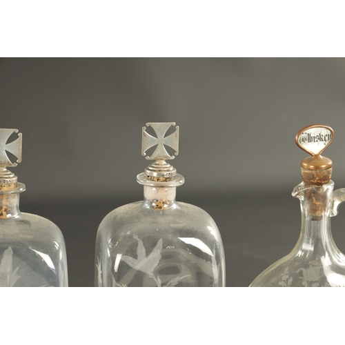 17 - A PAIR OF GEORGIAN RECTANGULAR SPIRIT DECANTERS with engraved labels and flower sprays, and a set of... 