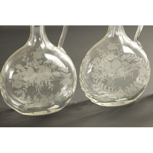 17 - A PAIR OF GEORGIAN RECTANGULAR SPIRIT DECANTERS with engraved labels and flower sprays, and a set of... 