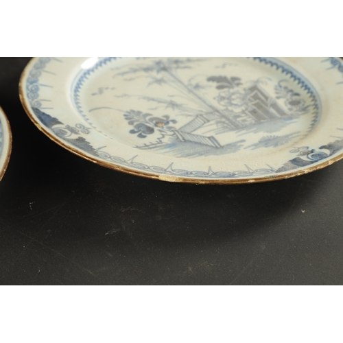 179 - A PAIR OF BRISTOL DELFT PLATES CIRCA 1760 AND A PAIR OF LIVERPOOL DELFT PLATES (23cm diameter)