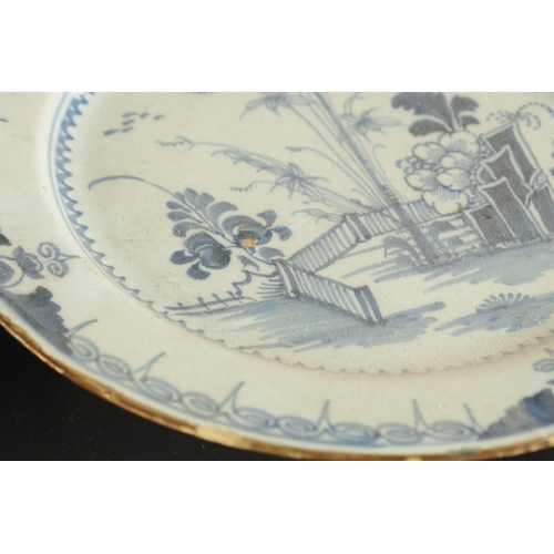 179 - A PAIR OF BRISTOL DELFT PLATES CIRCA 1760 AND A PAIR OF LIVERPOOL DELFT PLATES (23cm diameter)