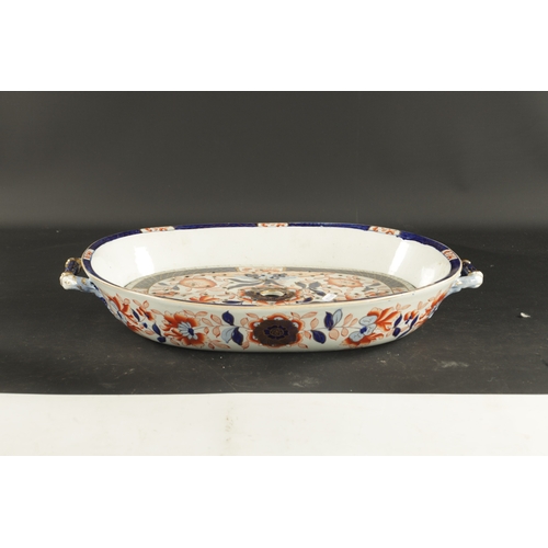 189 - A 19TH CENTURY IRONSTONE LARGE DISH AND DRAINER in Imari colours. (50cm wide)