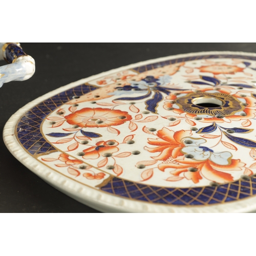 189 - A 19TH CENTURY IRONSTONE LARGE DISH AND DRAINER in Imari colours. (50cm wide)