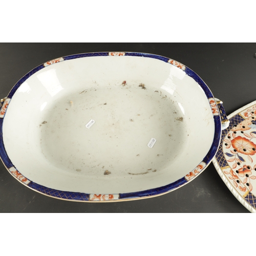 189 - A 19TH CENTURY IRONSTONE LARGE DISH AND DRAINER in Imari colours. (50cm wide)