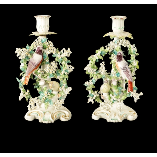 199 - A PAIR OF LATE 18TH CENTURY DERBY PORCELAIN CHAMBER STICKS (25cm high)