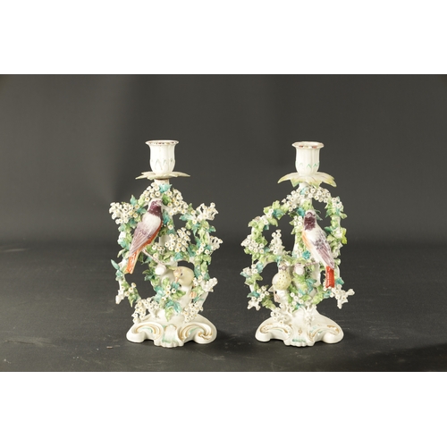 199 - A PAIR OF LATE 18TH CENTURY DERBY PORCELAIN CHAMBER STICKS (25cm high)