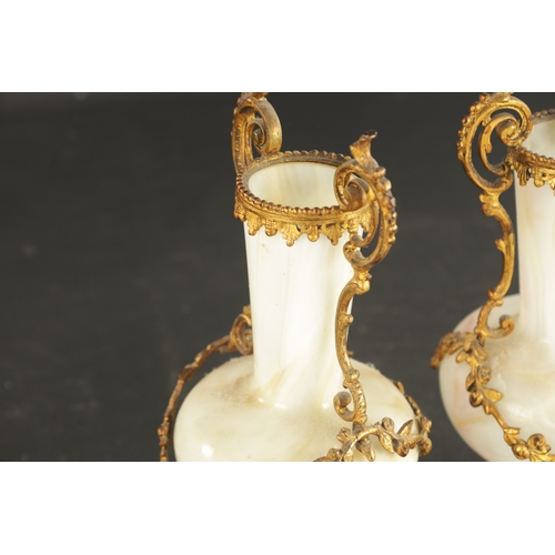 20 - A PAIR OF LATE 19TH CENTURY OPAQUE GLASS AND ORMOLU MOUNTED VASES with floral leaf decoration (23cm ... 