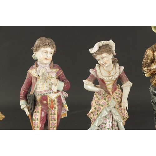 200 - A PAIR OF LATE 19TH CENTURY ROYAL DUX FIGURES OF BOYS along with THREE PAIRS OF CONTINENTAL FIGURES ... 