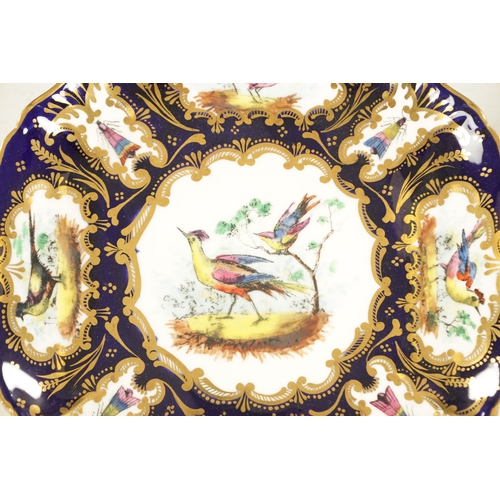 214 - A 19TH CENTURY STAFFORDSHIRE PORCELAIN DESSERT SERVICE CIRCA 1850 painted with exotic birds in panel... 