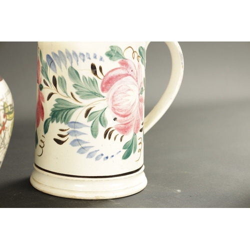 215 - THREE EARLY 19TH CENTURY ENGLISH POTTERY JUGS AND A MUG (18cm high and smaller)