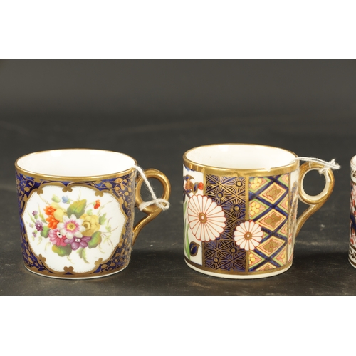 222 - A COLLECTION OF EIGHT MINTON COFFEE CANS CIRCA 1810 enamel and gilt decoration. (6cm high)