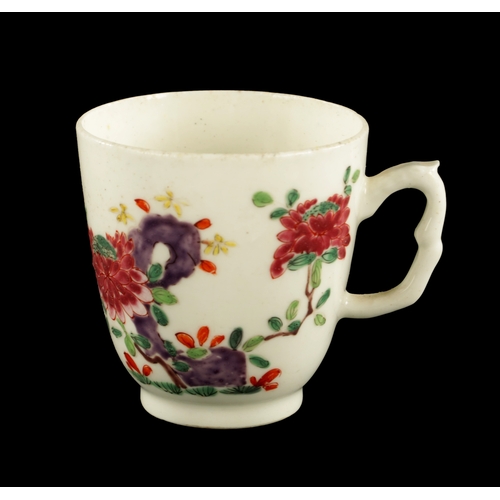 23 - A RARE BOW COFFEE CUP CIRCA 1755 PAINTED IN THE CHINESE TASTE WITH FLOWERING PLANTS (7cm high)