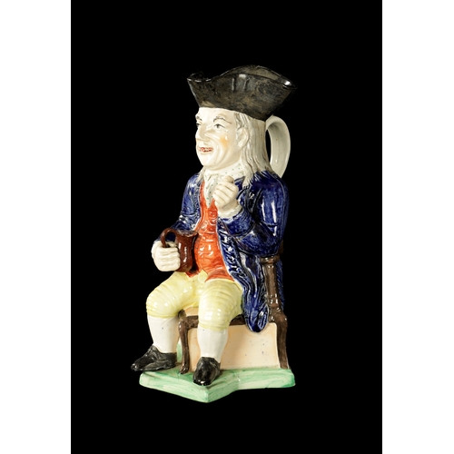 232 - A LATE 19TH CENTURY COPY OF A STAFFORDSHIRE SQUIRE TOBY JUG (28cm high)