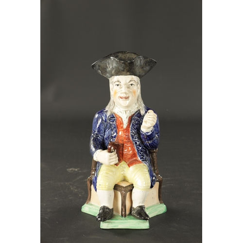 232 - A LATE 19TH CENTURY COPY OF A STAFFORDSHIRE SQUIRE TOBY JUG (28cm high)