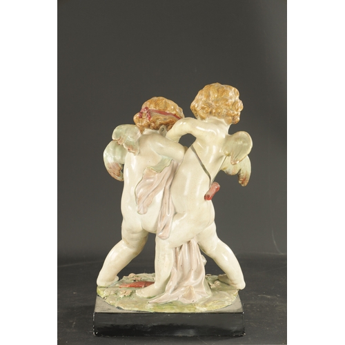 244 - A LARGE EARLY 19TH CENTURY STAFFORDSHIRE GROUP QUARRELLING CUPIDS possibly Enoch Wood. (43cm and Sma... 