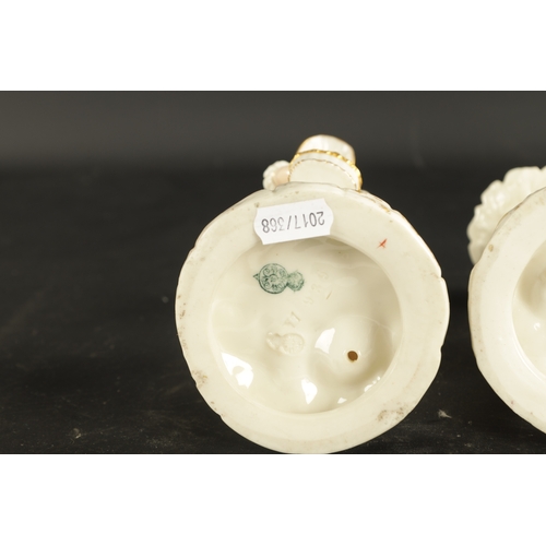 248 - A PAIR OF ROYAL WORCESTER CANDLESTICKS modelled by James Hadley circa 1870, along with a MINTON PORC... 