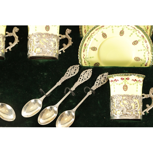 254 - A CASED ROYAL WORCESTER SIX PIECE COFFEE SERVICE WITH SILVER PLATED CUPHOLDERS AND SPOONS yellow gro... 