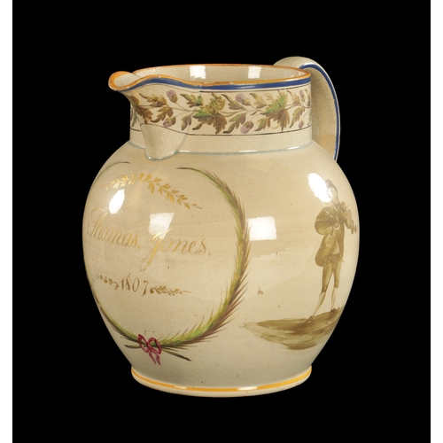 256 - A RARE PEARLWARE JUG PAINTED WITH A MUSICIAN INSCRIBED THOMAS JONES 1807 (23c high)