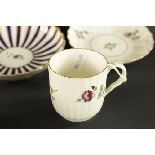 258 - A WORCESTER FLUTED CUP AND SAUCER PAINTED WITH FLOWERS CIRCA 1770, together with A DERBY PORCELAIN C... 