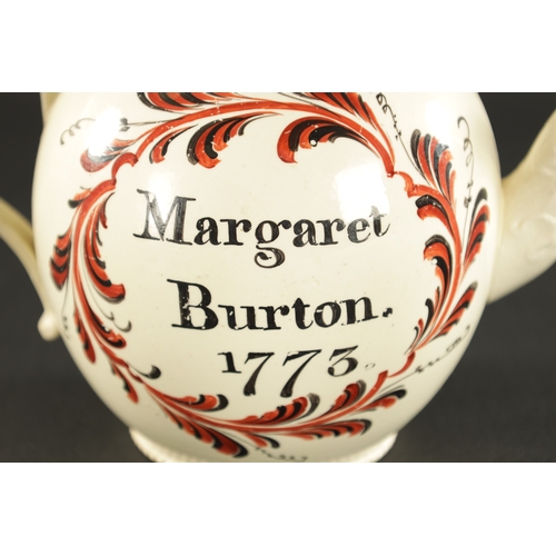 262 - A RARE 18TH CENTURY LEEDS CREAMWARE TEAPOT painted Margaret Burton and dated 1773 (22cm wide, 14cm h... 