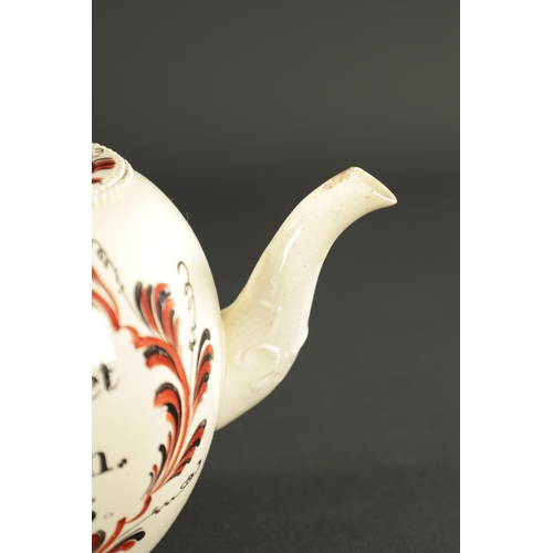 262 - A RARE 18TH CENTURY LEEDS CREAMWARE TEAPOT painted Margaret Burton and dated 1773 (22cm wide, 14cm h... 