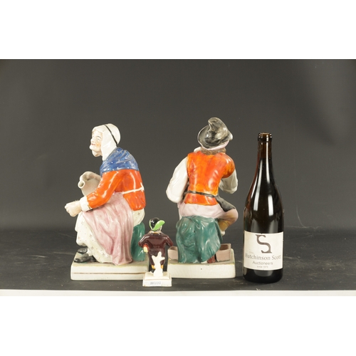 265 - A PAIR OF STAFFORDSHIRE FIGURES CIRCA 1860 OF JOBSON & NELL and a smaller Staffordshire figure of a ... 